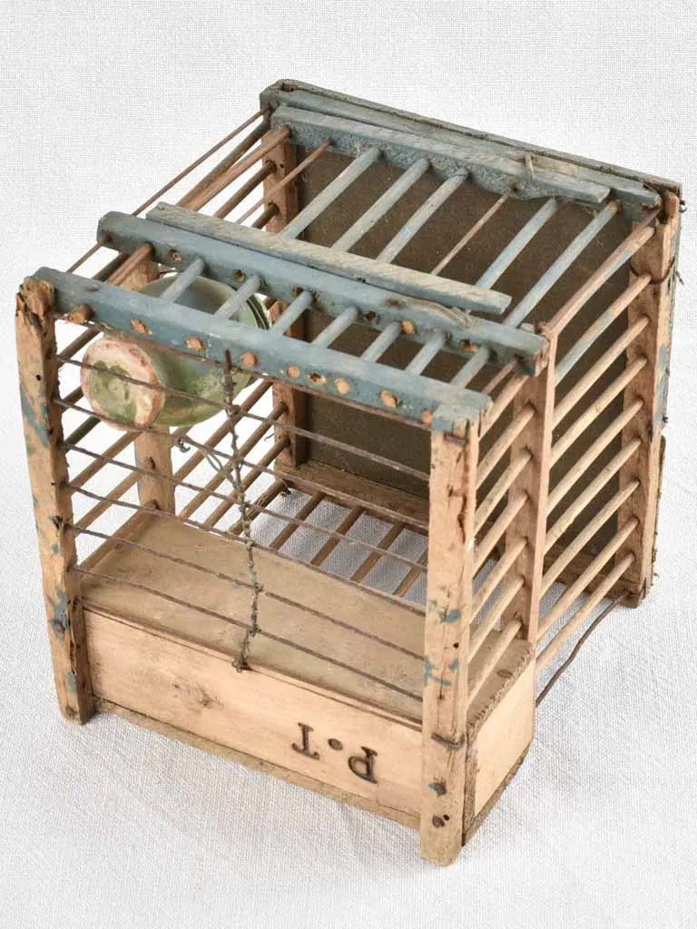 Small birdcage with P.T initials 7½"